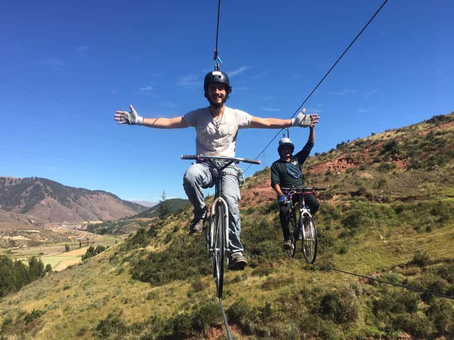 Cusco: Extreme Sky Bike and Rappelling Adventure - Climbing 45 meters on the via ferrata