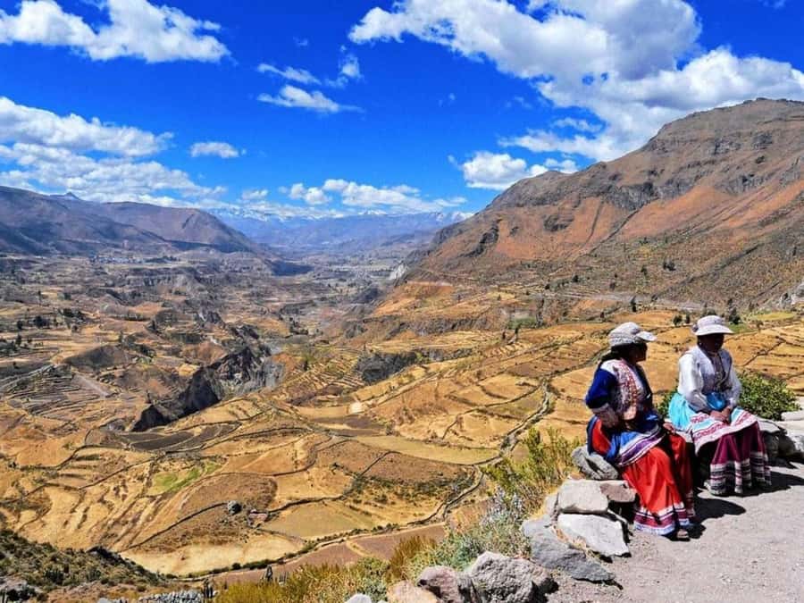From Arequipa: Full Day Tour of Colca Canyon with Meals - Antahuilque and Choquetico explain the valley