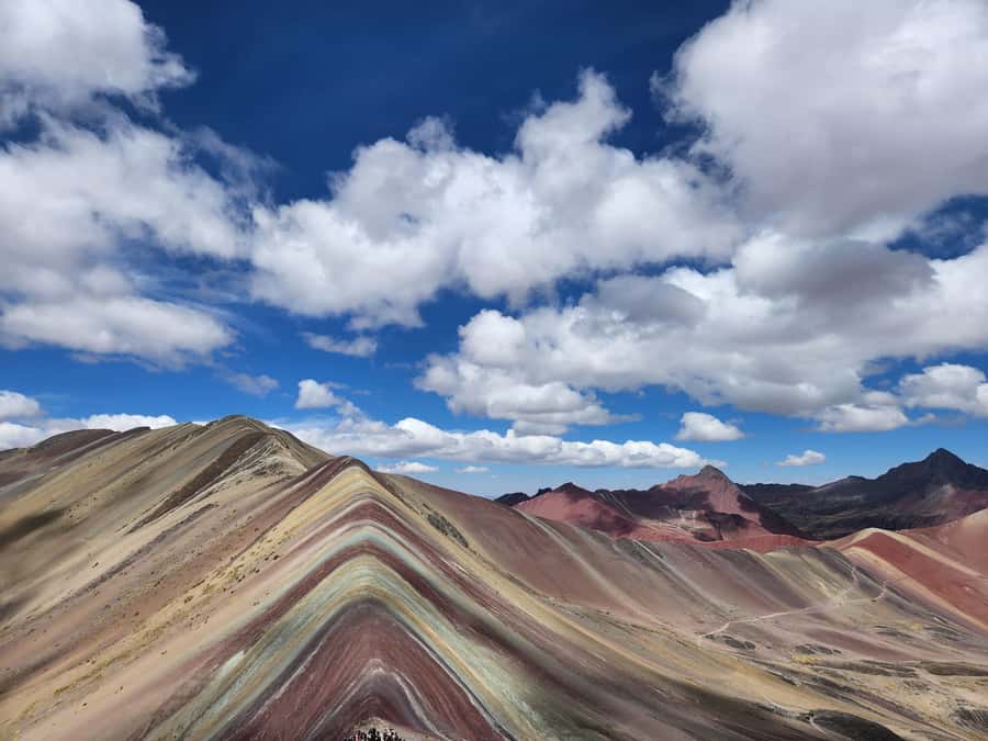 From Cusco: Full Day tour to Rainbow mountain and Red Valley - Rainbow Mountain’s striped slopes and crowded timing
