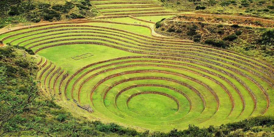 From Ollantaytambo: Moray, Maras, and Chinchero Guided Tour - Maras: Salt pools still worked by local families