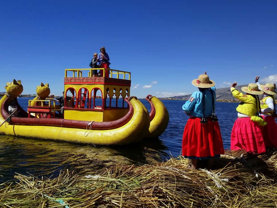 From Puno: Floating Islands of the Uros Half-Day Tour - The traditional reed boat costs extra