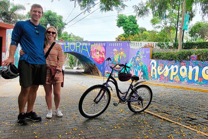 Lima Bike Tour in Miraflores & Barranco - Shared small group - Walking across the Bridge of Sighs