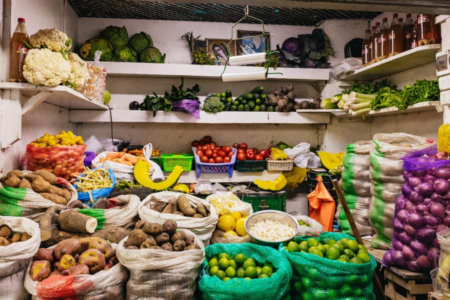 Lima: Historic Center Street Food, Market, and Eateries Tour - Anticuchos, churros, picarones, and the sweet side of Lima