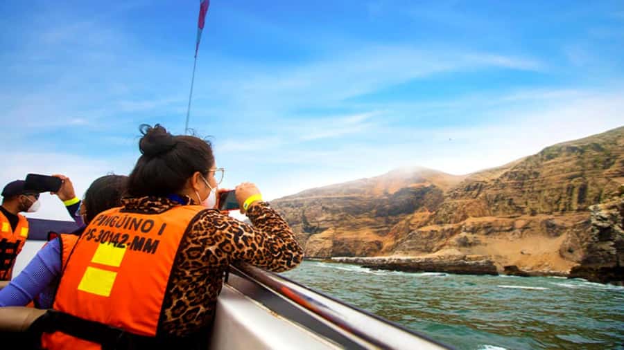 Lima | Islas Palomino Tour | Swim with Sea Lions - San Lorenzo Island and the passage past El Camotal
