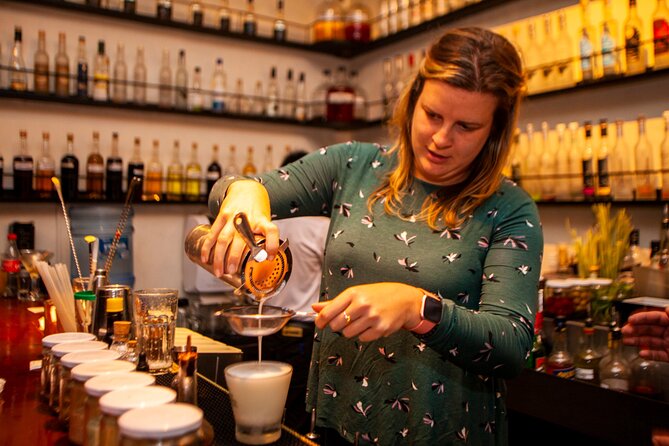 Pisco Sour Secrets: Hands-On Mixology in Historic Cusco - Mixing the five essential ingredients