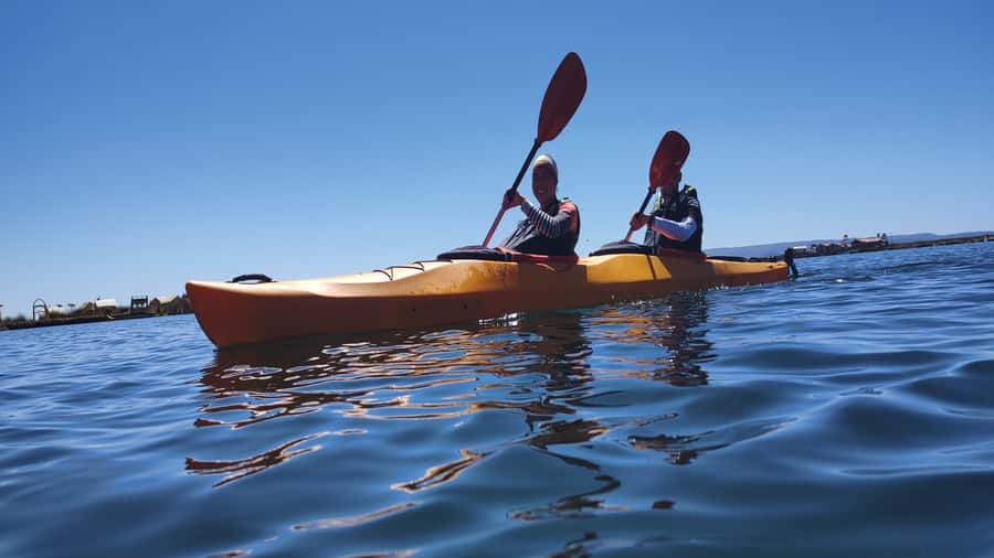 Puno: 2-day Uros Kayak Tour with Homestay at Amantani Island - Paddling from Puno toward the Uros Islands