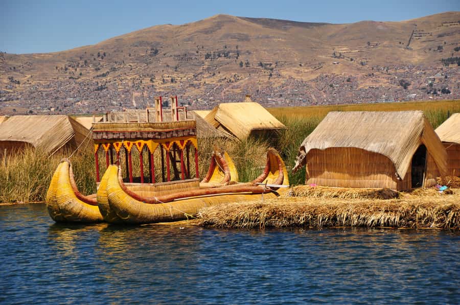 Puno: Lake Titicaca Day Tour - The covered motor boat to the Uros islands