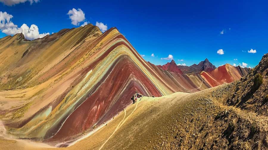 Rainbow Mountain tour and Machu Picchu tour by train - Guides, transfers, and group size