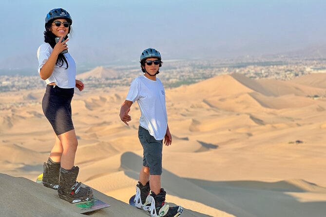 Sandboard and SandSki Experience in Huacachina - Sunset on the dunes near the oasis